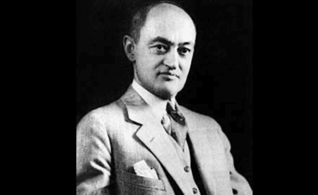 Portrait en noir et blanc de Joseph Schumpeter, économiste autrichien, figure majeure de la pensée économique