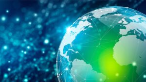 Globe terrestre numérique avec réseaux d'interconnexions mondiales illustrant le débat sur la démondialisation