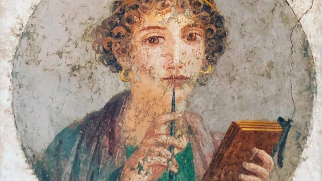 Fresque romaine antique représentant une femme au stylet et tablette, illustration de la méthodologie introduction de dissertation d'histoire